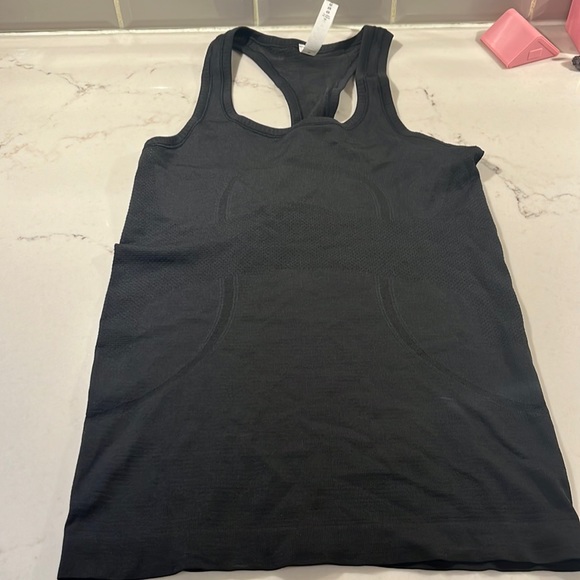 lululemon athletica Tops - New with tags lulu size 4 swifty racer back